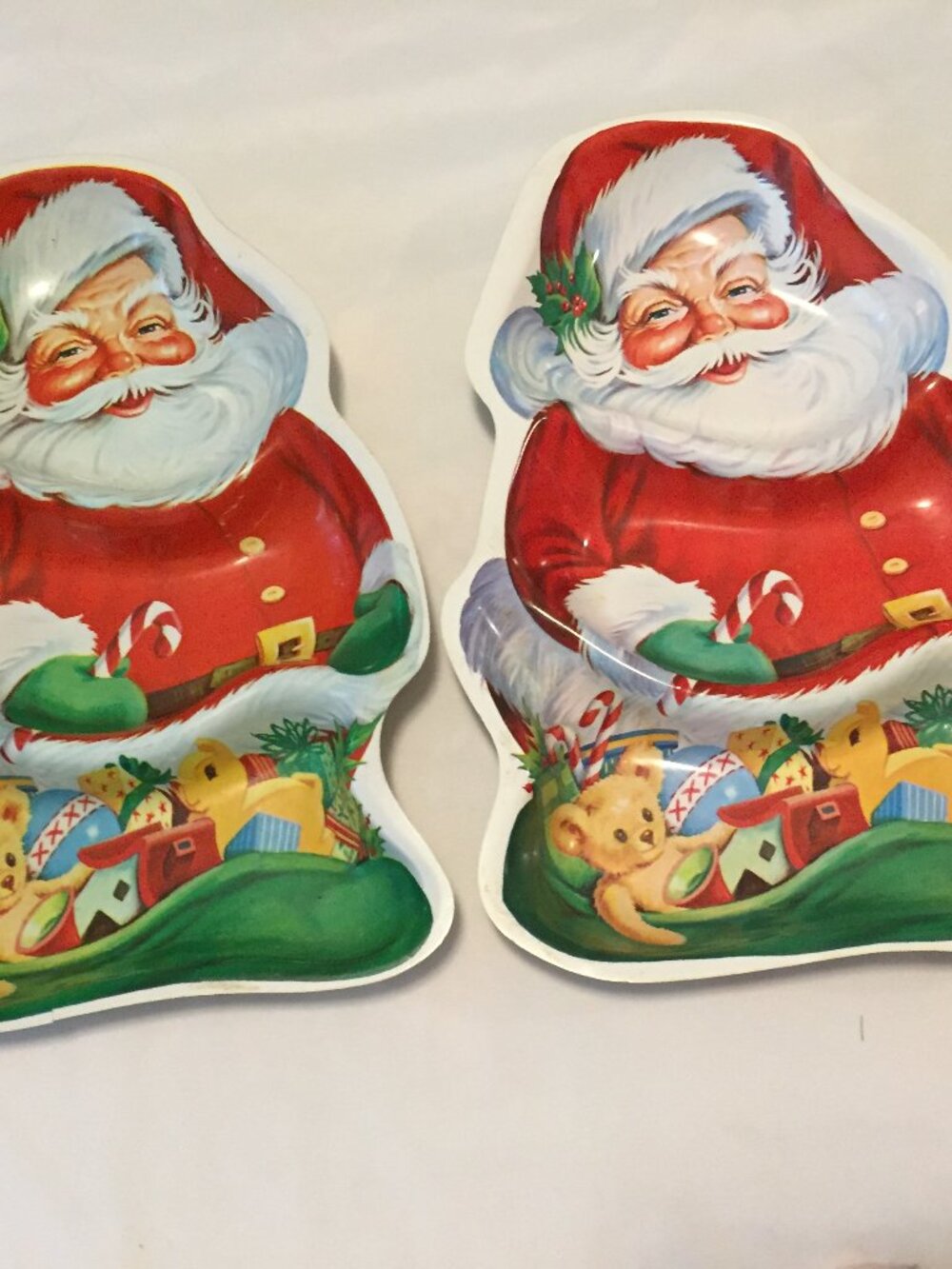 2 Vintage Plastic Santa Claus Decorative Trays   One has small cracks on the edg